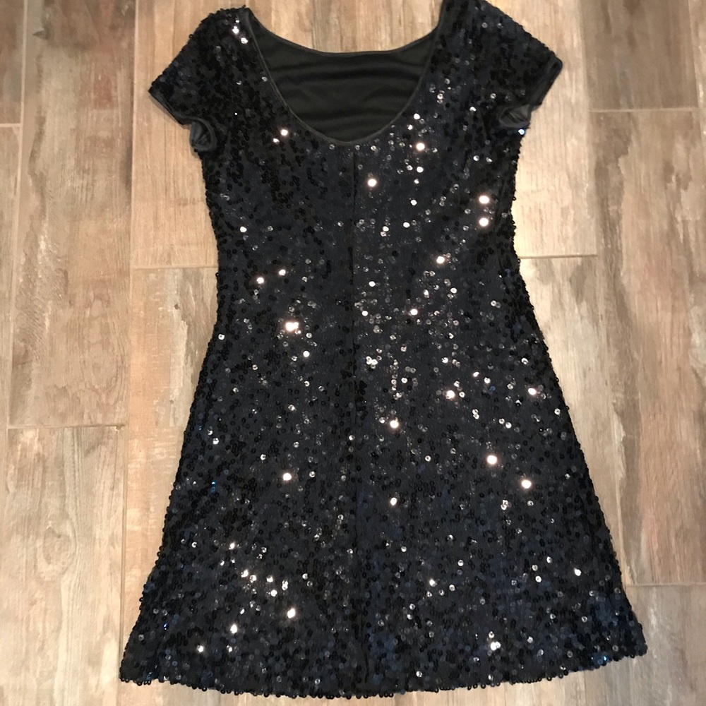 Sequined black cocktail dress